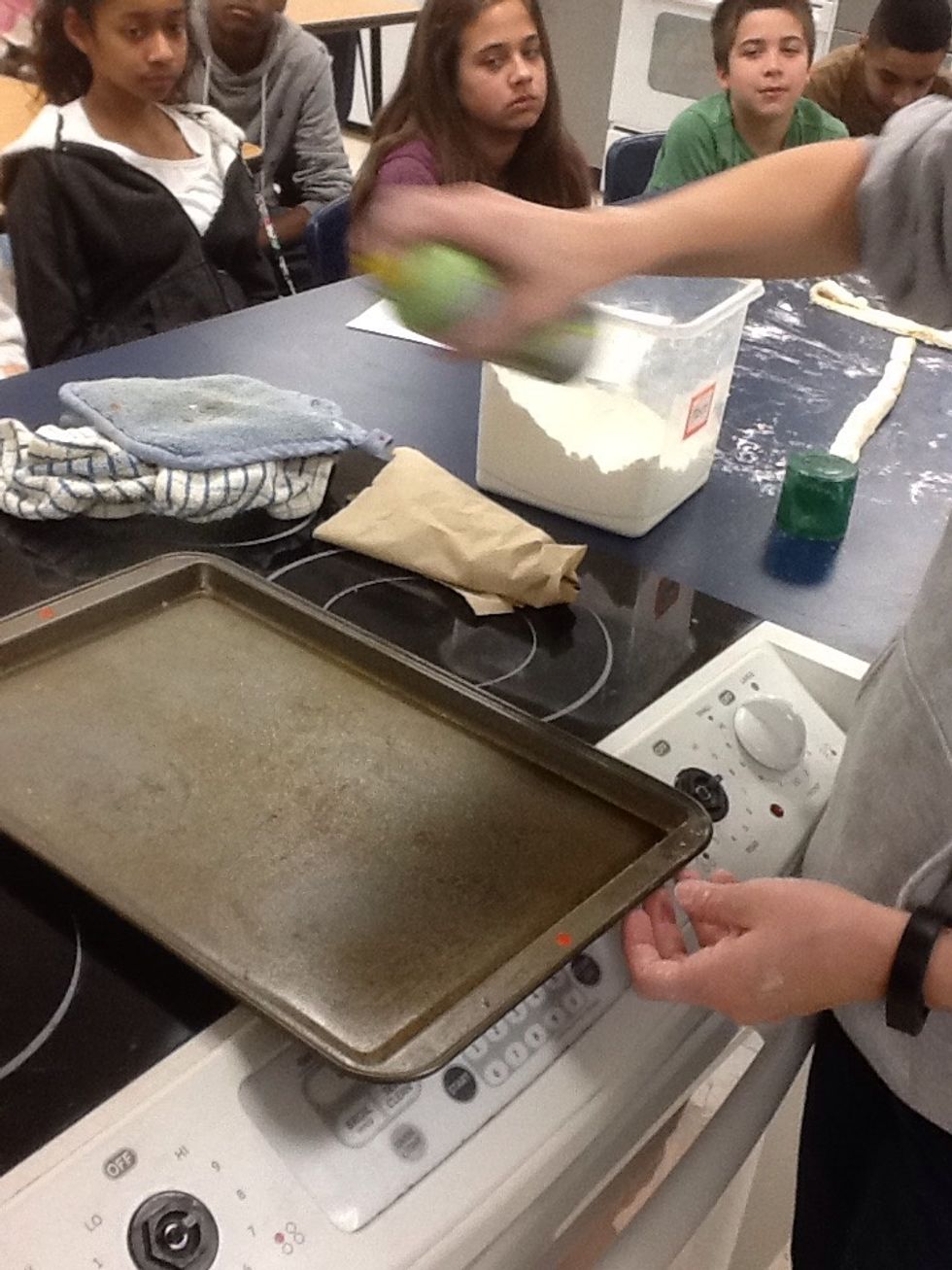 Spray cookie sheet with nonstick cooking spray