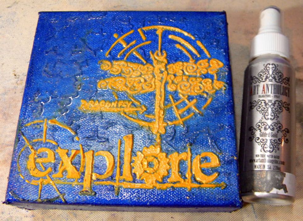 Spray Gilded Gold Colorations Spray on the top and let dry. I wanted the background to have a golden glimmer and this Spray does the trick!