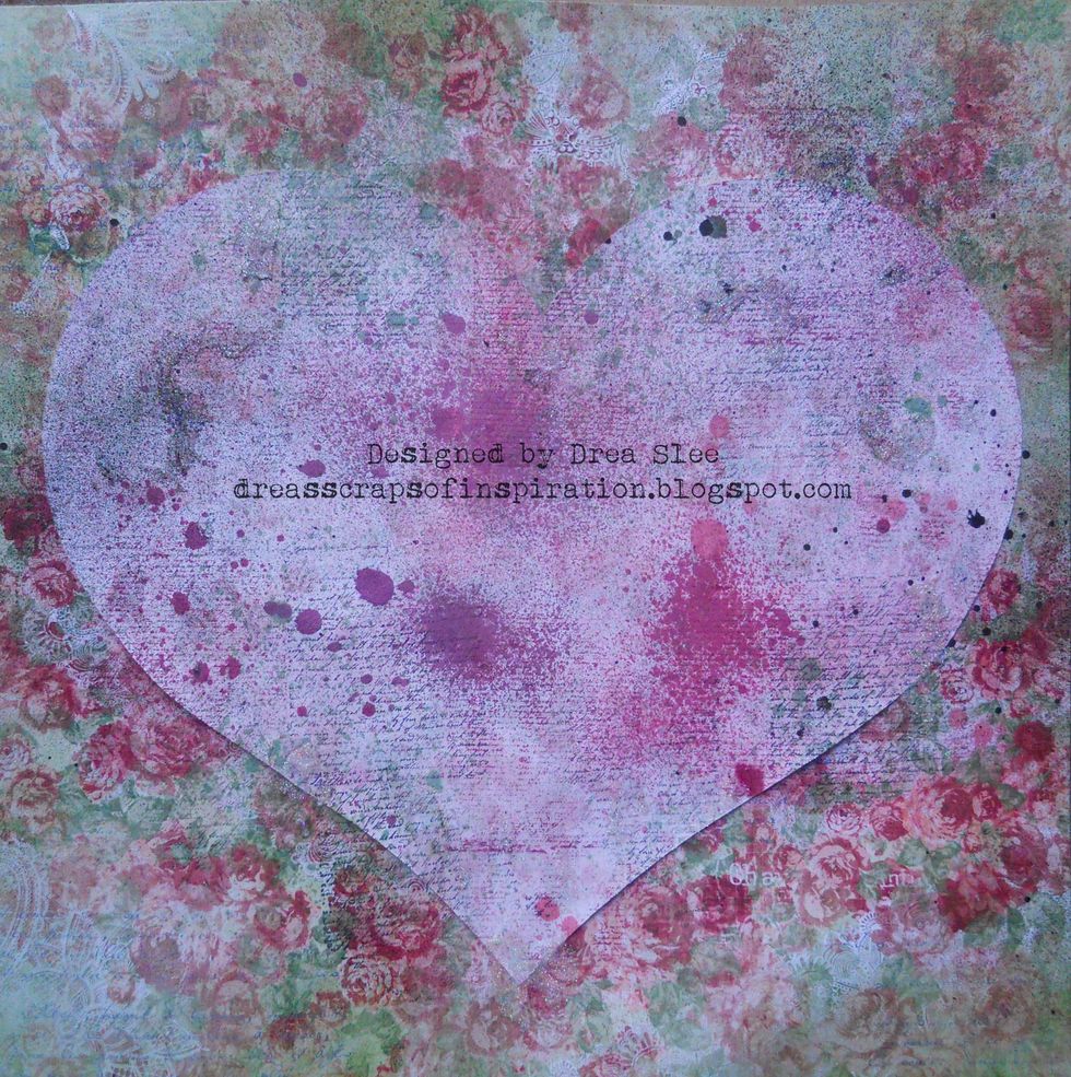 Spray heart and background with mists or sprays. I used some pinks, green, and black.