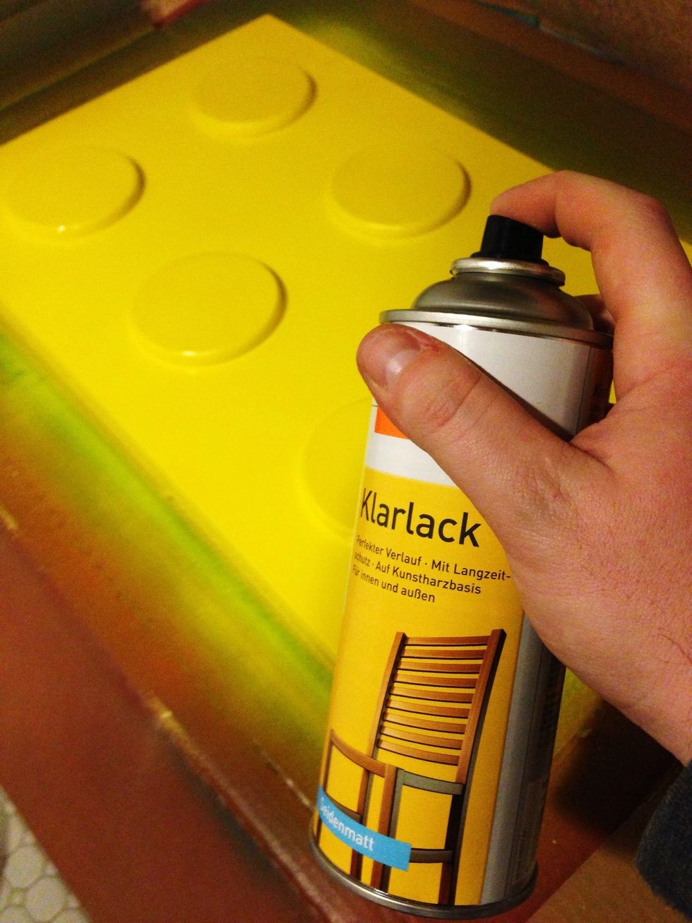 Spray it with clear varnish as soon as the color has dried. It will improve the lifetime of the color and give it a glossy finish.