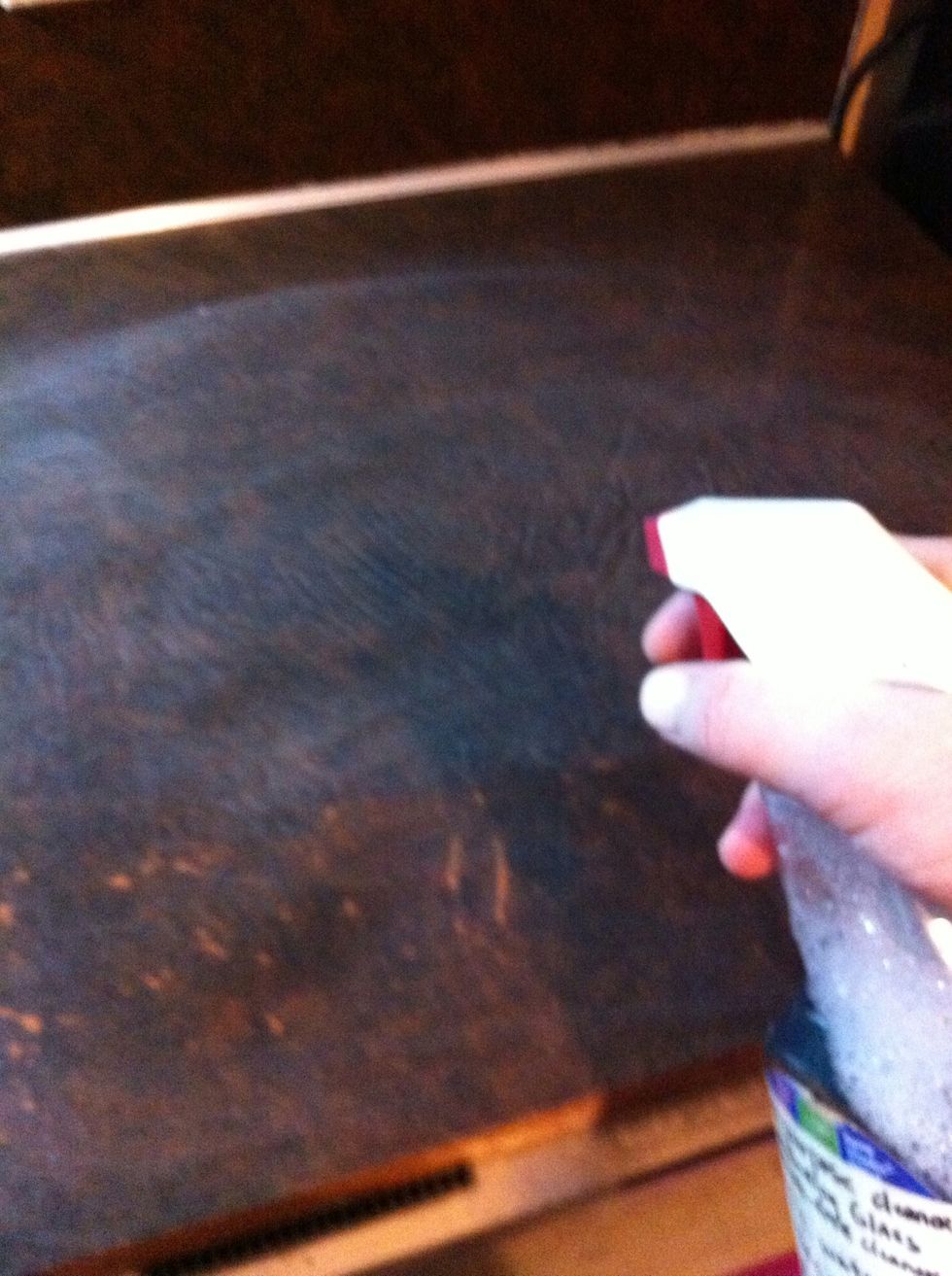 Spray liberally on all areas where the Baking Soda film was left.