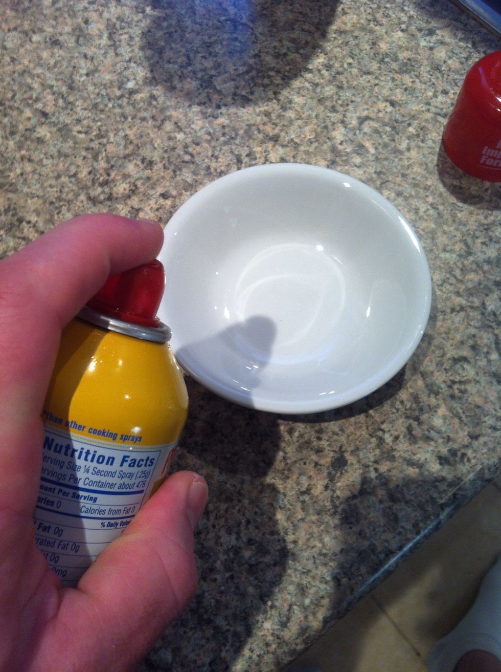 Spray lightly with cooking spray. Push down your toast. The count down begins.