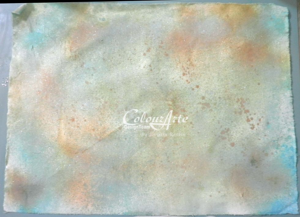 Spray muslin with Radiant Rain Shimmering Mists\u2122 in this order: Autumn Leaf, Butternut, Seafoam, Key Lime, and Teal Zircon. Allow to dry.