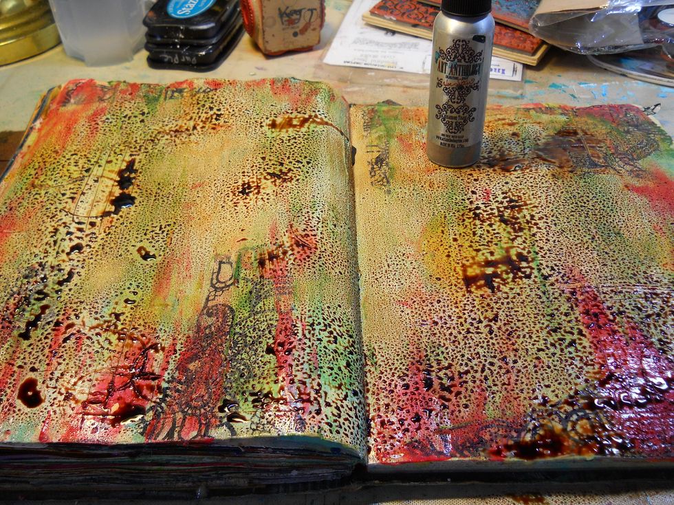 Spray on top of that a nice layer of AA "Sandcastle" , allow this to sit for a few minutes then dab off the excess with a paper towel.