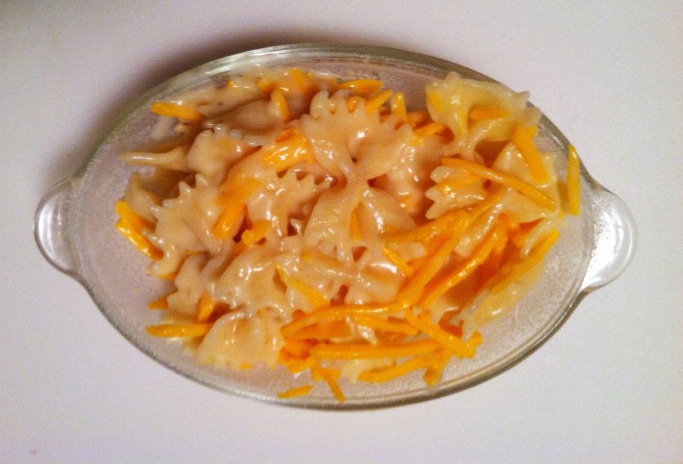 Spray or grease a glass dish and add the 2-cheese mixture.