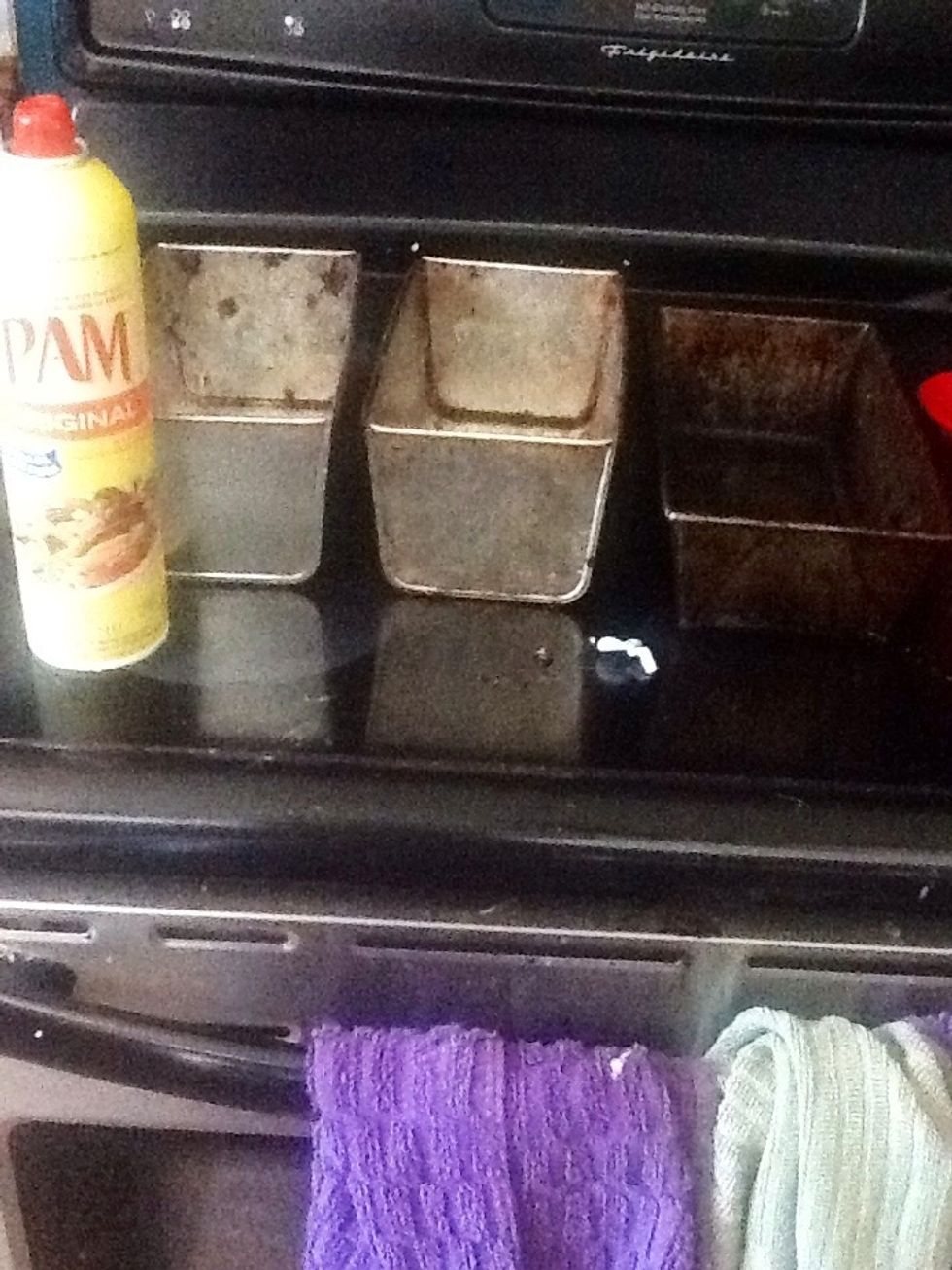 Spray or grease three bread pans. This can make four loaves if you want them a bit smaller.