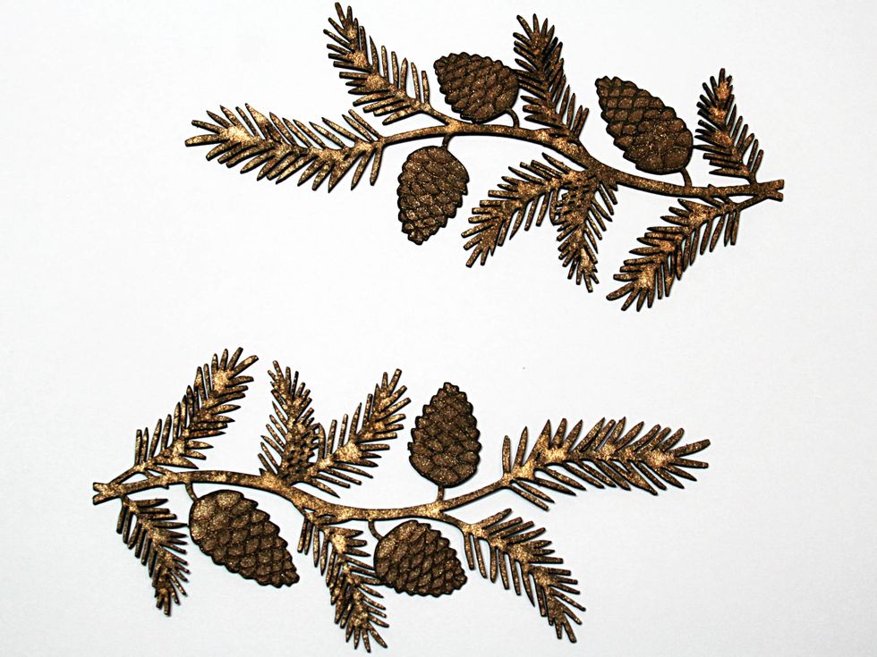 Spray or paint on mist to color the Creative Embellishments pine branches.