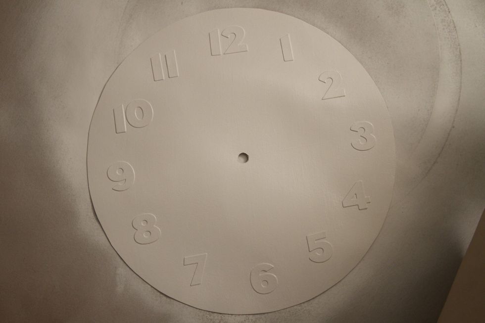 Spray paint the clock face white.