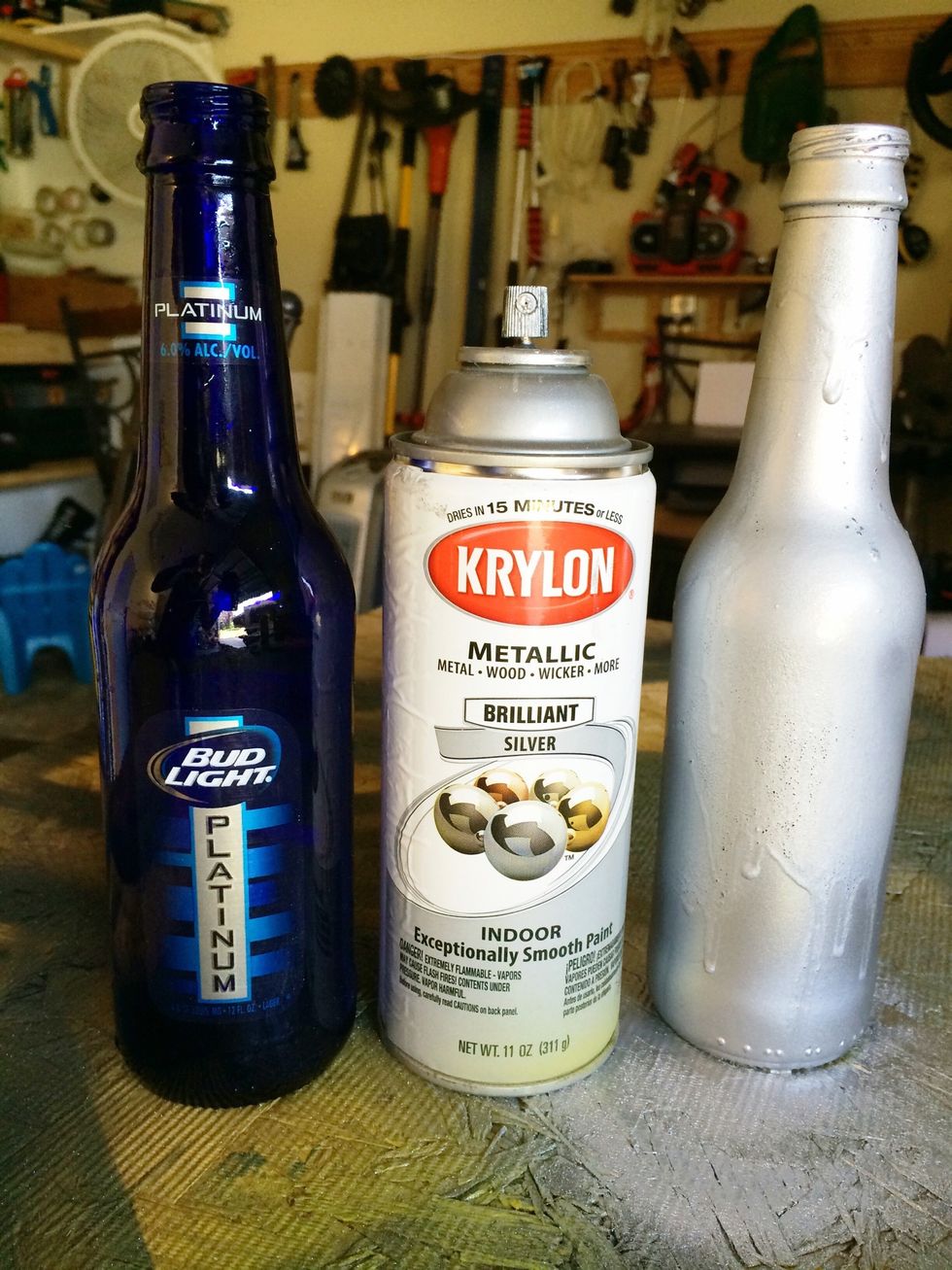 Spray paint your 2 smaller bottles in a contrasting color. I chose to go silver! Again...I didn't remove my labels. :)