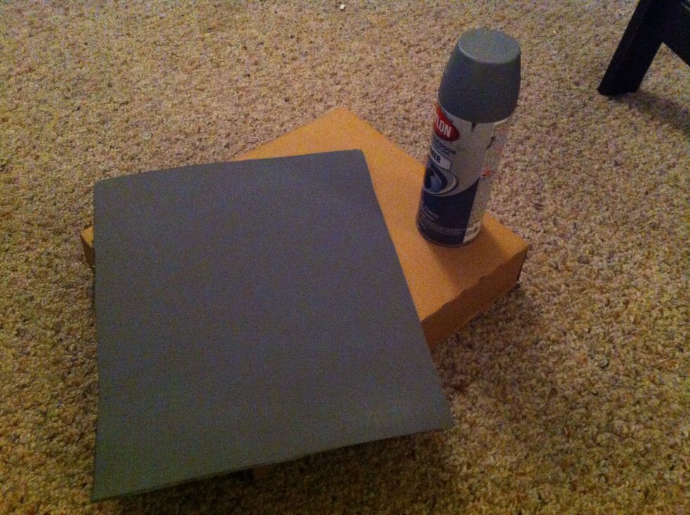 Spray paint your cardboard to any color you would like. It is not necessary to spray both sides, unless your heart desires! :)