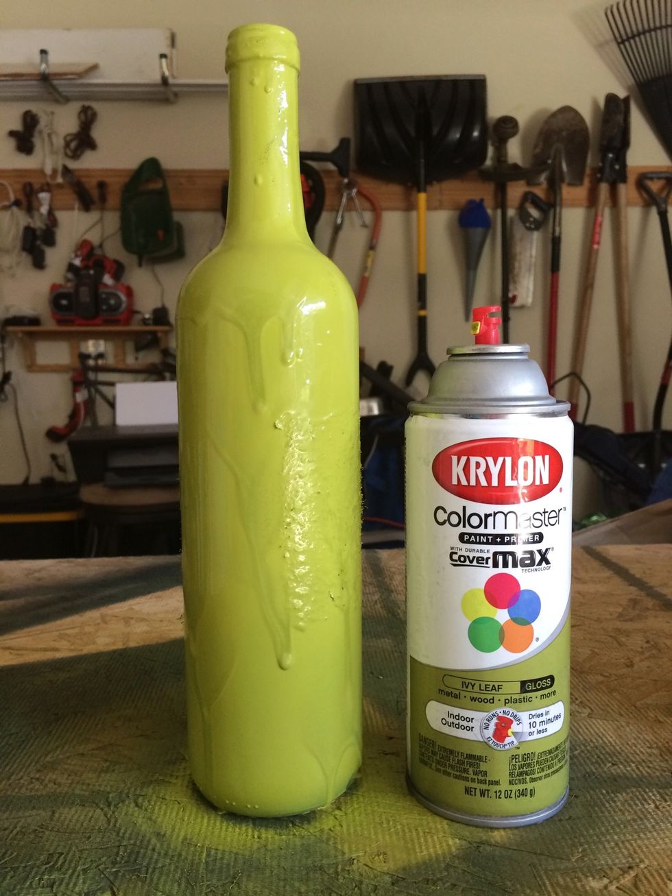 Spray paint your Wine bottle. I removed the labels the best I could but left the "fuzzy" leftovers to add texture.
