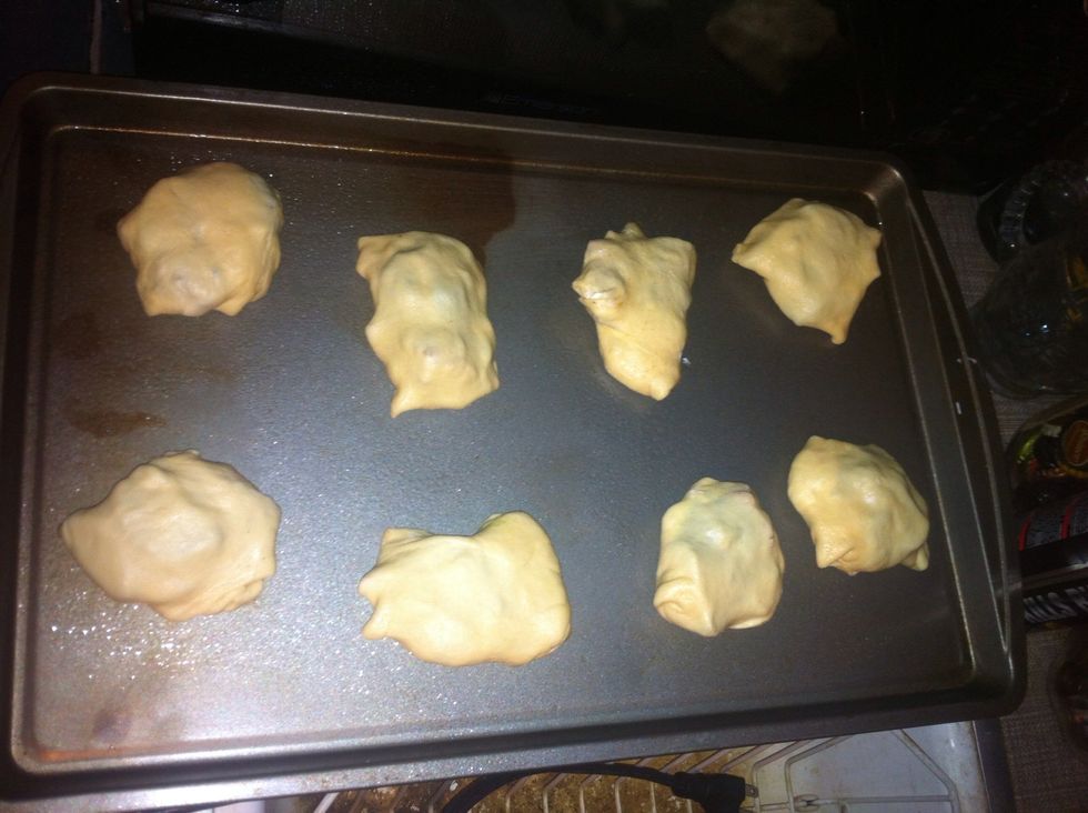 Spray pan with nonstick cooking spray. Lay crescent rolls with the seam down.