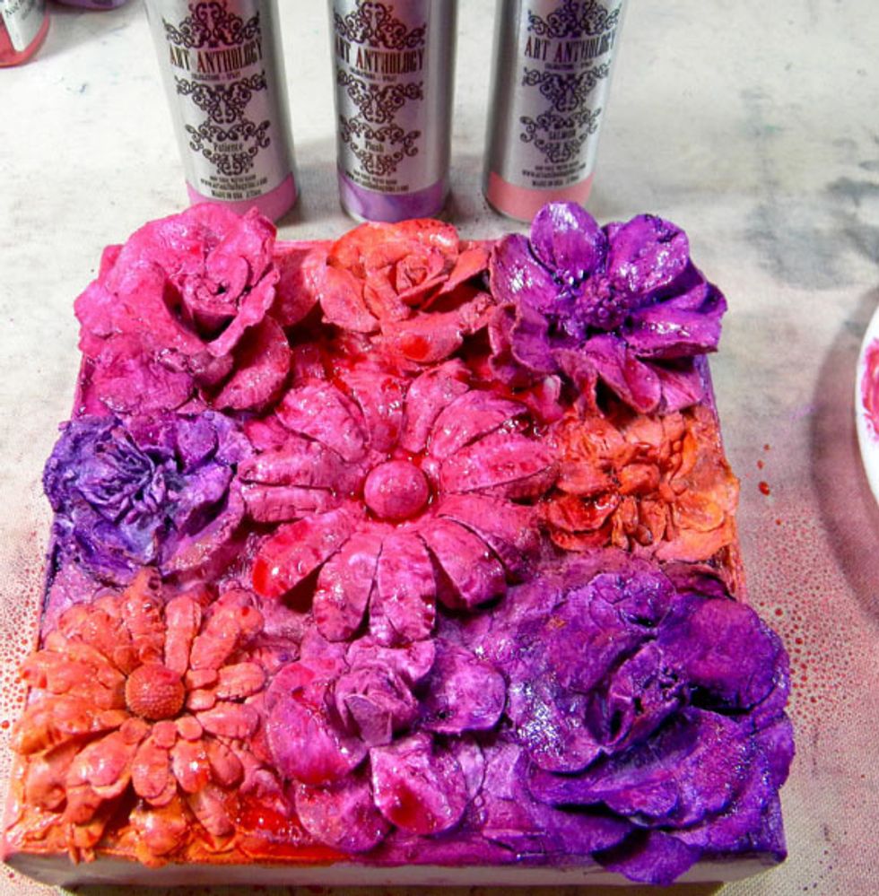 Spray Patience Colorations Spray on the pink flowers, Plush on the purple flowers and Salmon on the orange flowers.  This helps to cover any white areas that are showing. Dry with heat tool.