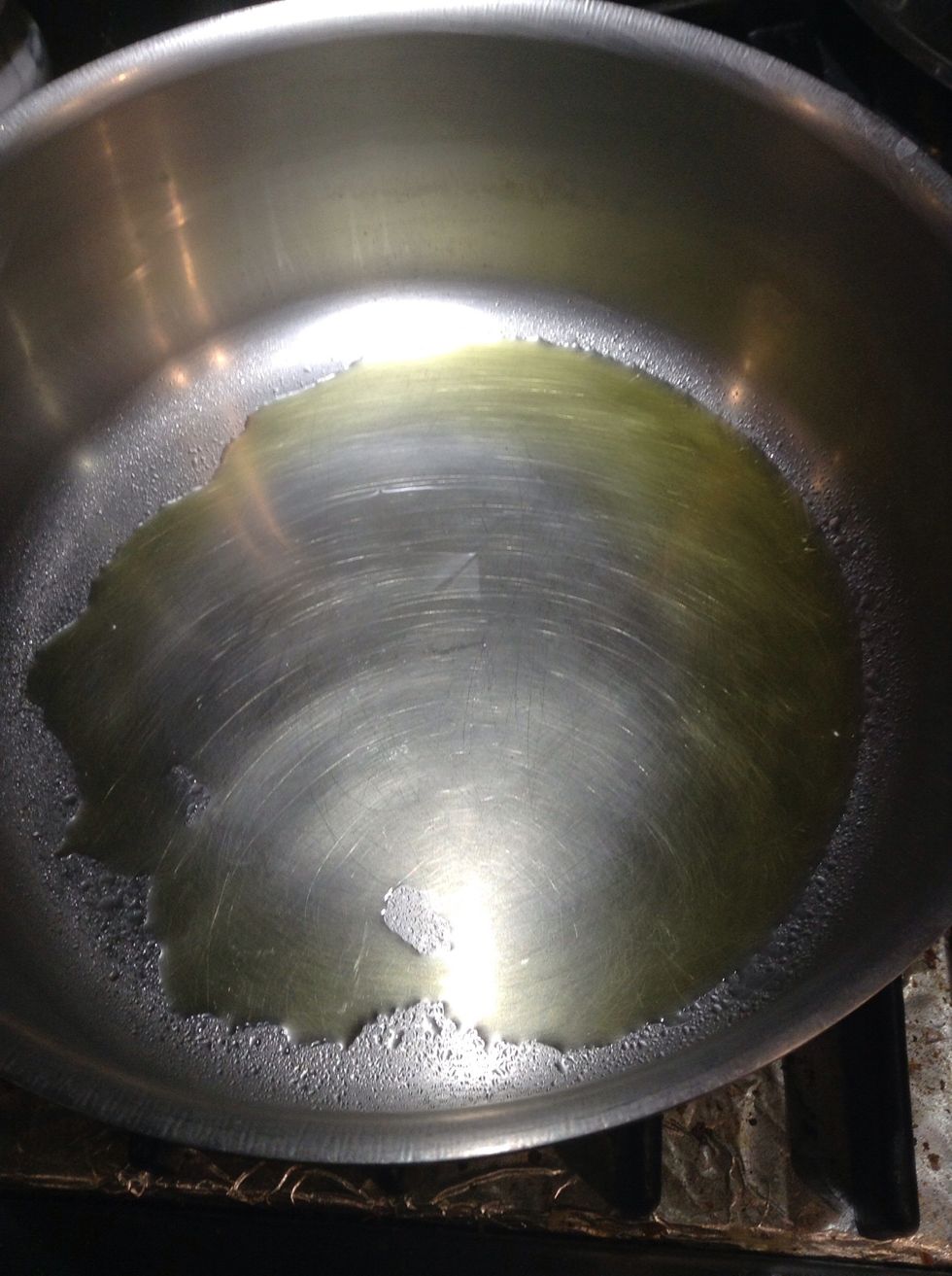 Spray stew pot (10 - 12 qt.) with cooking spray then add 2 tbls. olive oil preheat pot between medium, med-high heat.   **Note you may have to cut roast in half to fit in pot.