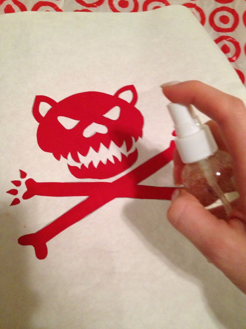 Spray the area in the stencil from about 6" away.