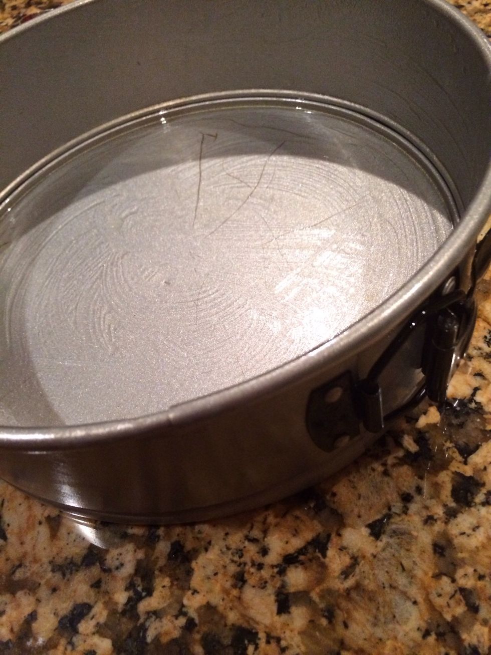 Spray the cheesecake pan with cooking spray
