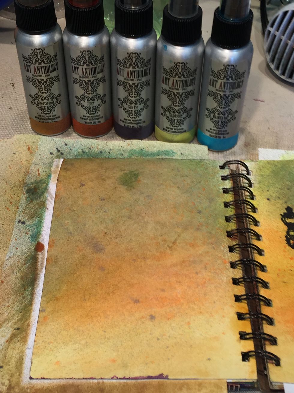 Spray the left side of your journal with Waimea Bay, Glorious, Silk Tie, Salted Caramel, and Juicy, wiping in between colors.  I tried to duplicate what I had on the right side.