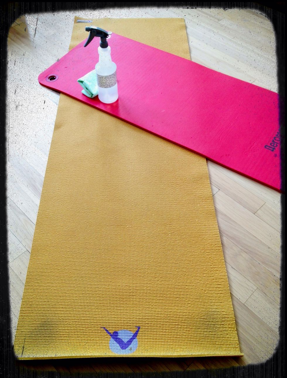 Spray the mat and let the cleaner soak in for a couple of minutes. Scrub with a washcloth. Lay out to dry before using.