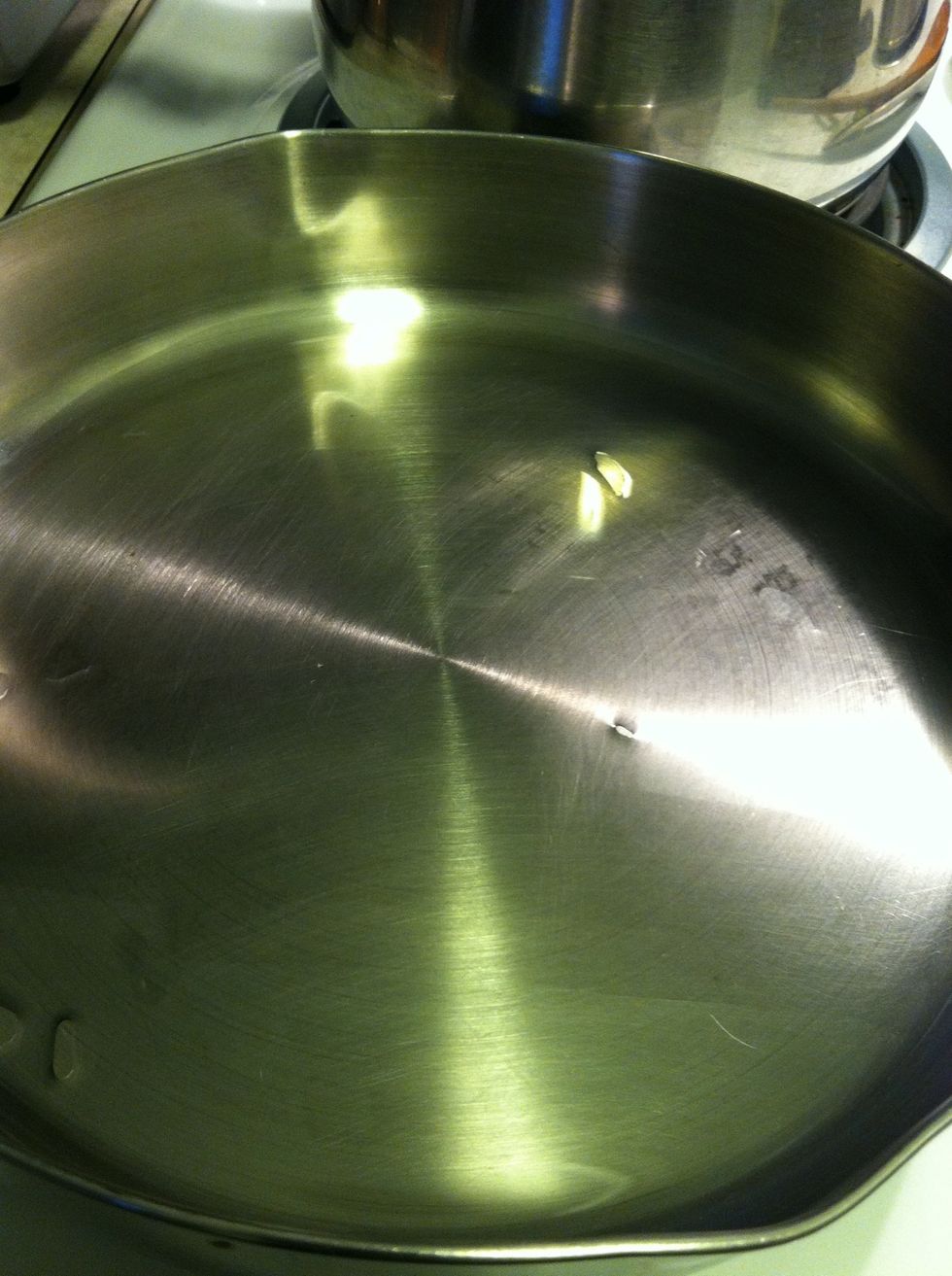 Spray the pan with PAM cooking spray, or olive oil. Make sure it covers the entire pan you never know what side of the pan the egg with stay in