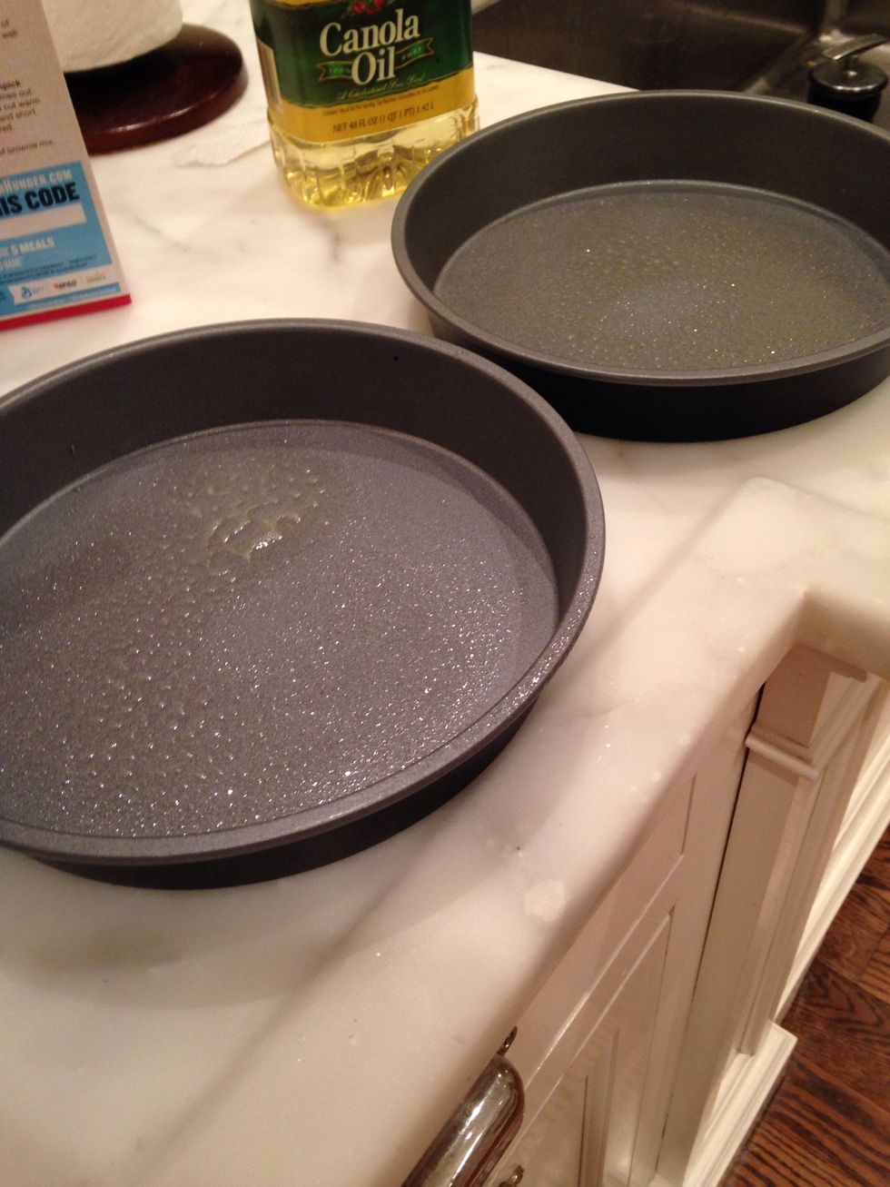 Spray the pans with cooking spray