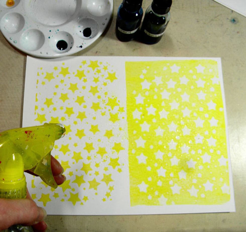 Spray the print generously with water.