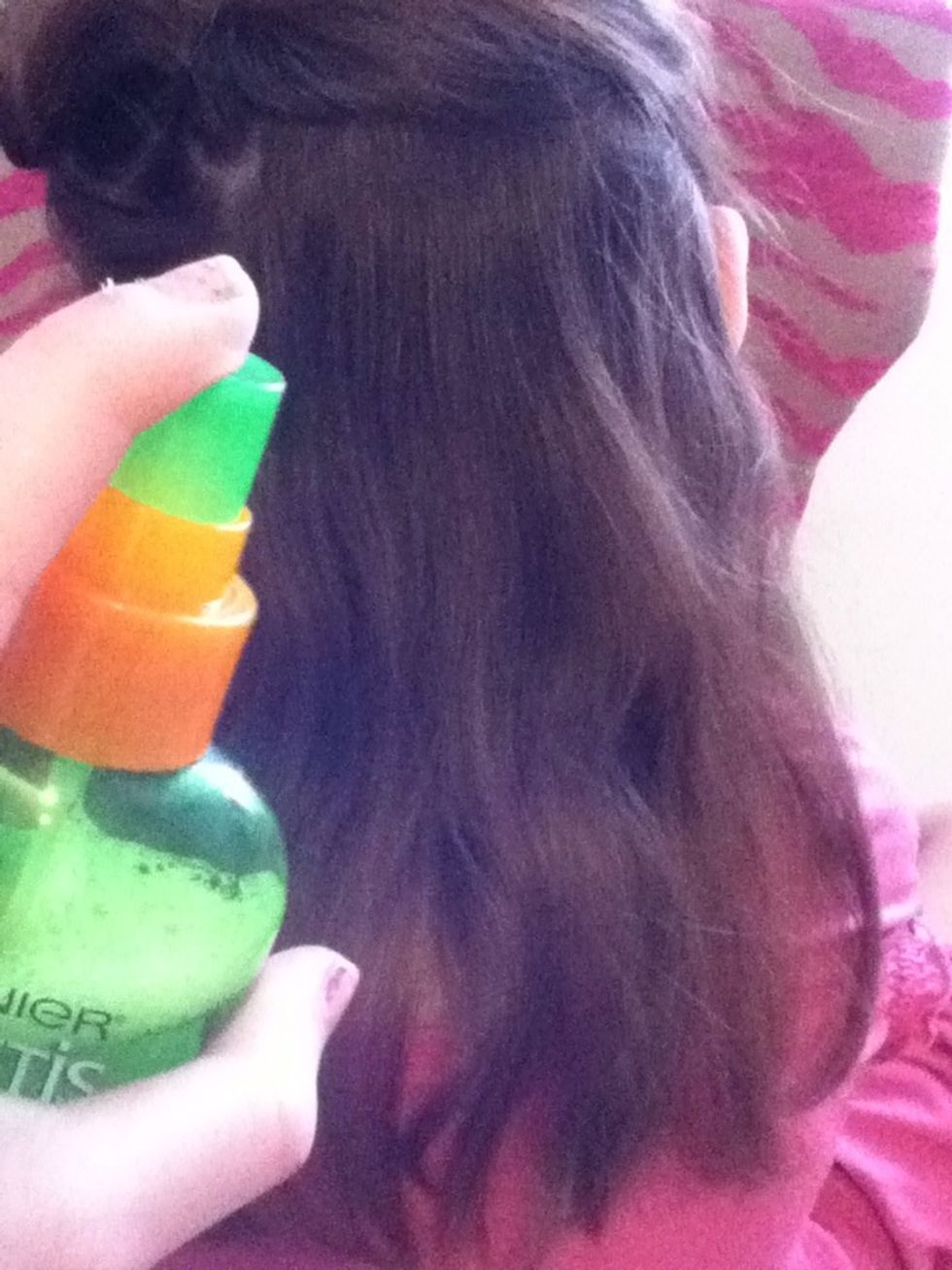 Spray the protectant on your hair\ud83d\udc86