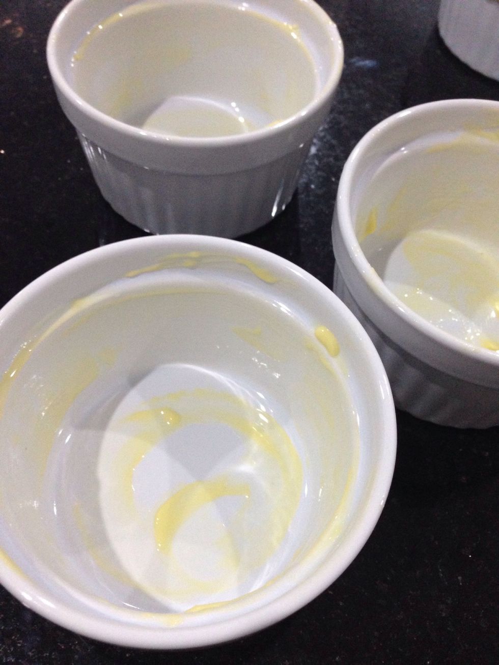 Spray the ramekins with cooking spray or butter the ramekins