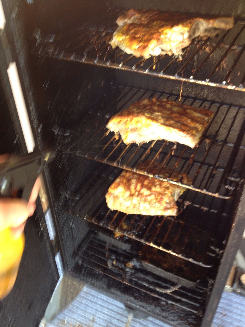Spray the ribs with the following mixture every 45 min. This will allow the ribs to stay moist & add flavor. The spray bottle should consist of a 60/40 mixture of apple cider vinegar & vegetable oil.
