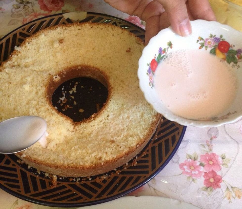 Spray the strawberry milk on the parts of cake