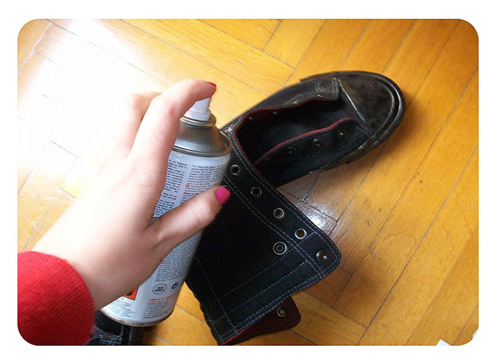 Spray the white parts of the shoes (sole and toe) with the spray paint. I used black paint but you could do whatever color you want or skip this step and leave the shoes unpainted.