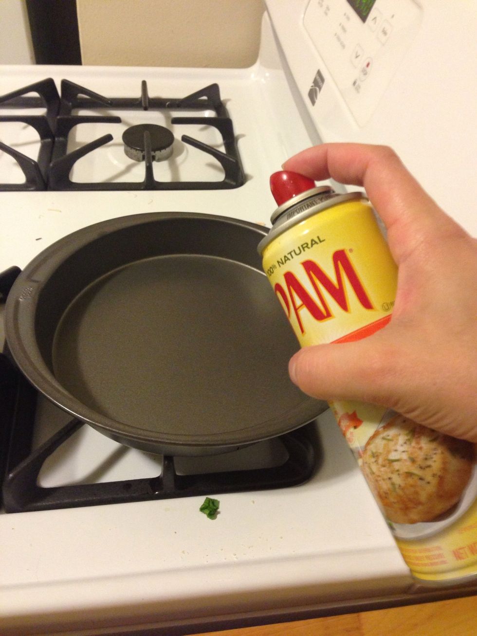 Spray two pans with nonstick spray.
