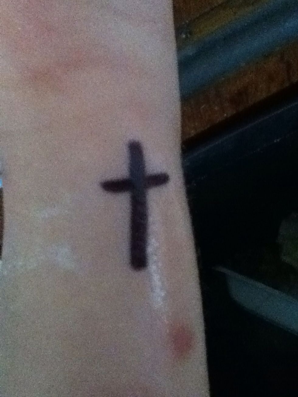 Spray with hairspray, a lil away from it and take a napkin and dab it DONT wipe the tattoo