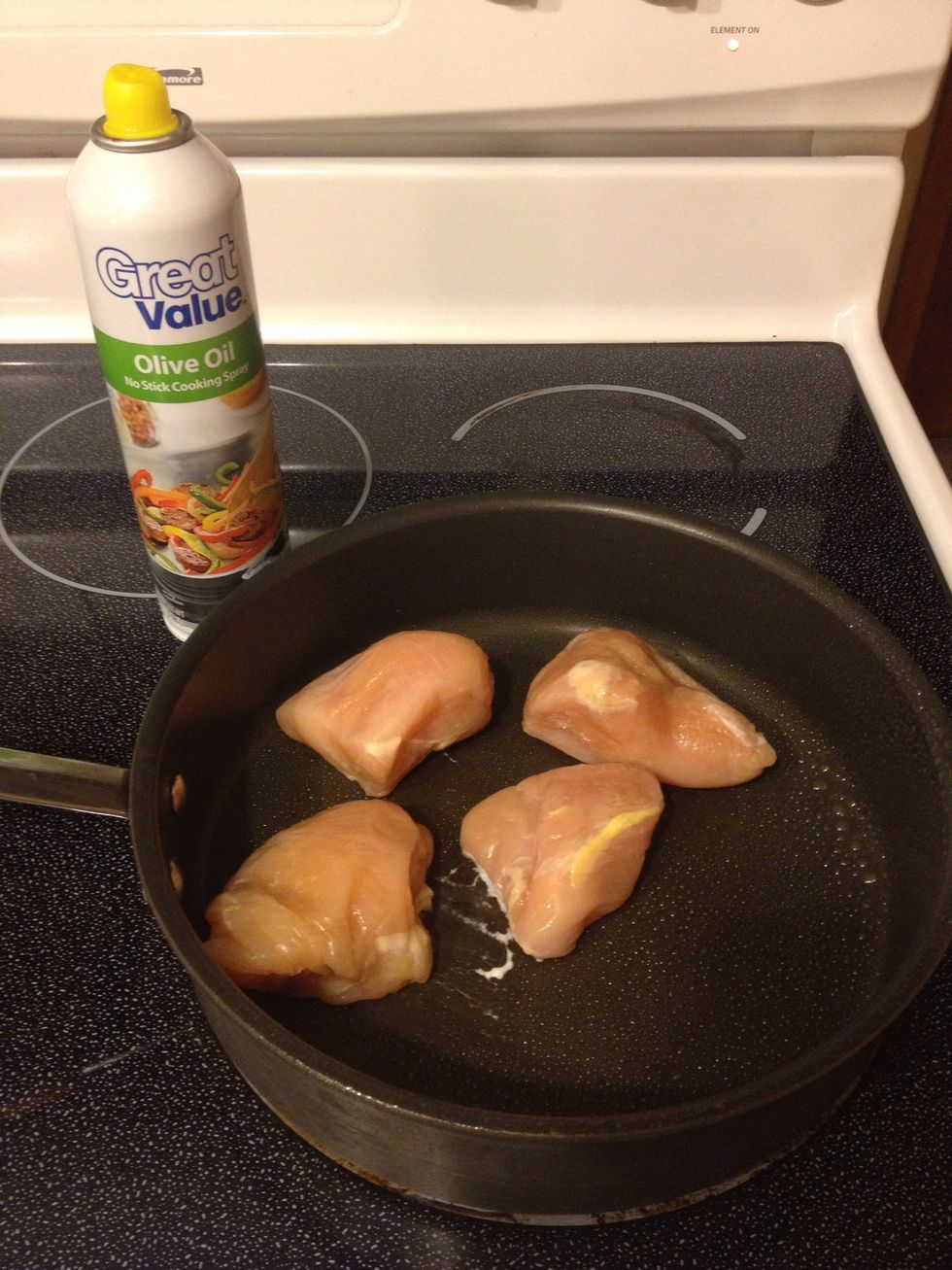 Spray with non stick cooking spray. Place chicken breasts to cook. I plan on shredding my chicken. You can cube them first then cook if you choose so.