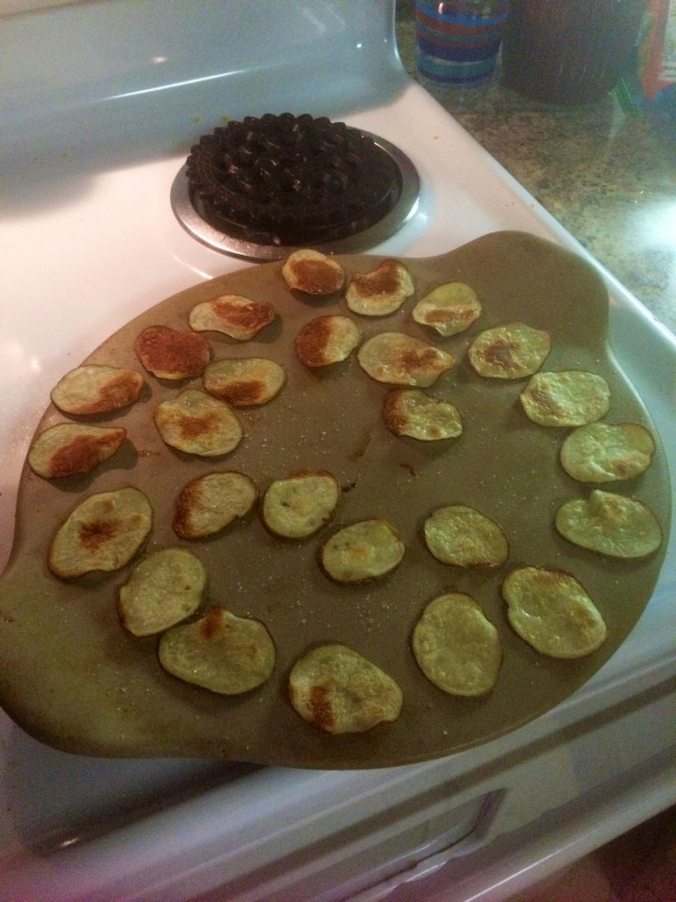 Spray with olive oil and sprinkle with salt. Bake at 425 for 8 minutes. Flip the chips and cook for another 5 minutes or so. You want them lightly starting to brown on the edge. Do not over cook!