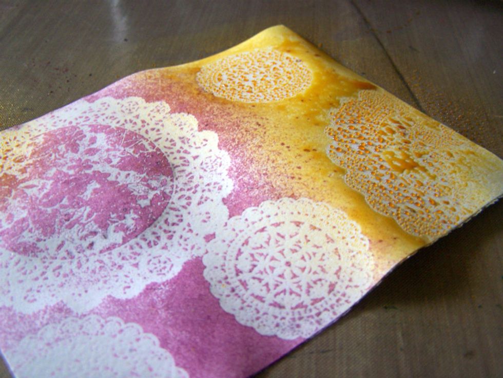 Spray with Timeless Colorations and wipe excess with a paper towel. Dry with a heat gun.