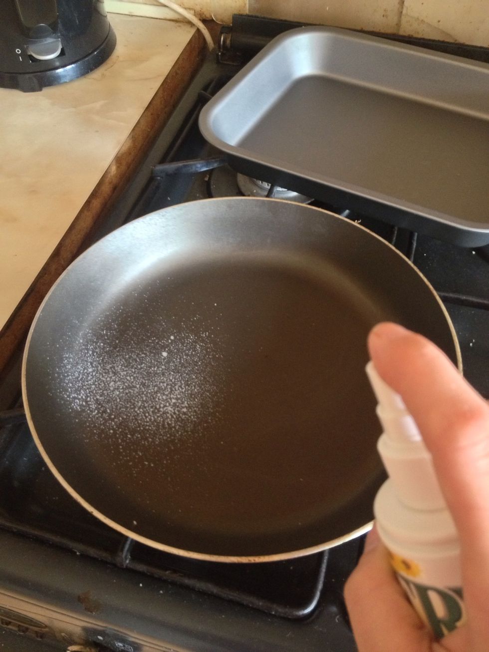 Spray your frying pan with any healthy oil you like. I'm using Fry Light here. But you could use Coconut oil. Then turn the hob on to a medium heat.