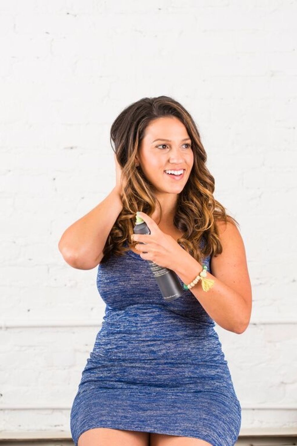 Spray your hair with hair spray to give it extra hold and texture.