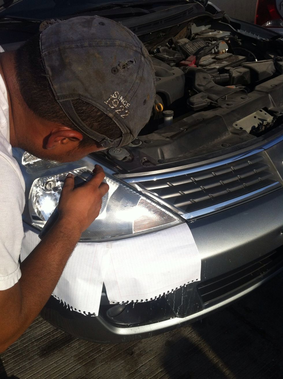 Spray your headlights  with your transparent paint 7 inches  away from it