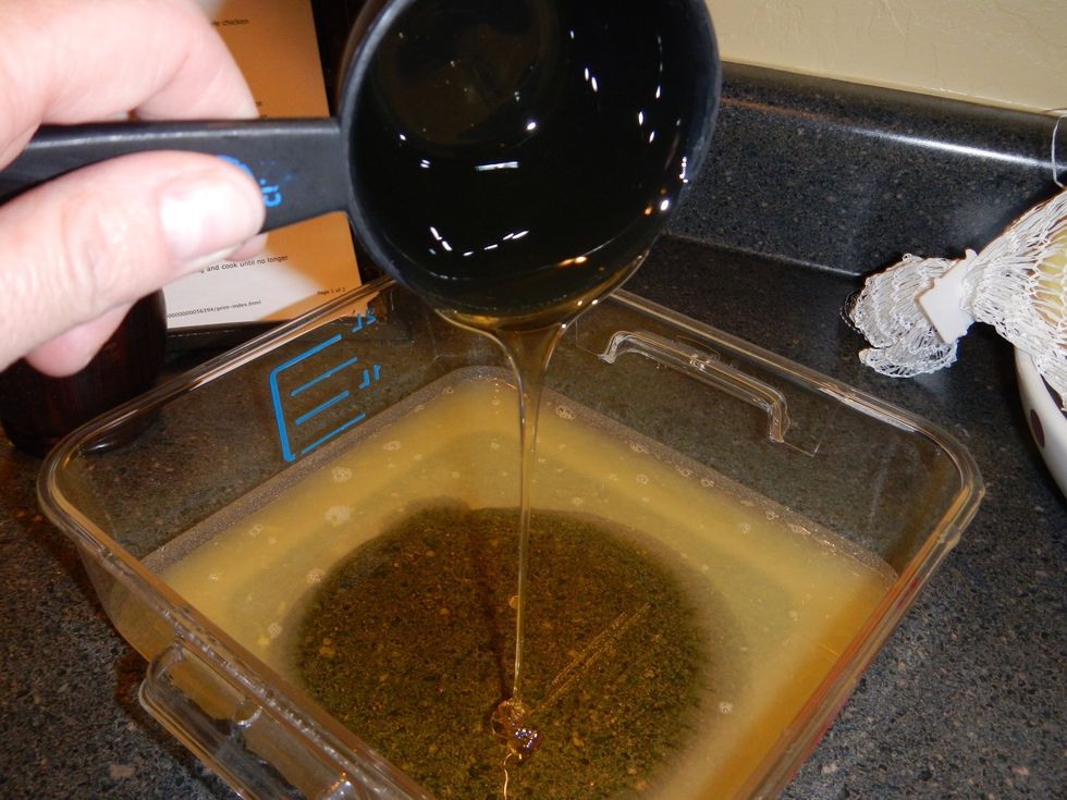 Spray your measuring cup with a little cooking spray before measuring the honey...it will slide right out and not stick to the cup!