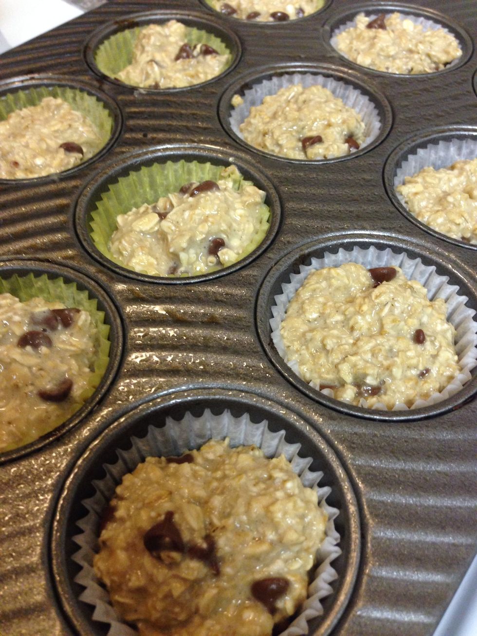 Spray your muffin tin with non-stick cooking spray and fill your muffin cups pretty full. These will not rise.