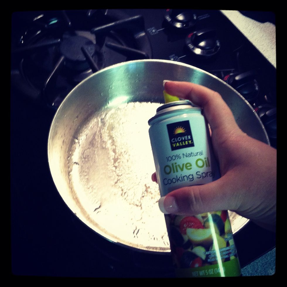 Spray your pan with olive oil