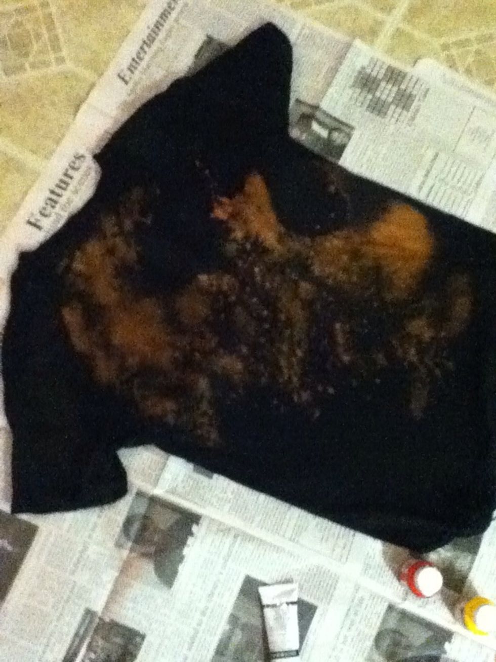 Spray your shirt and let the bleach mixture do its job, then remove the tape
