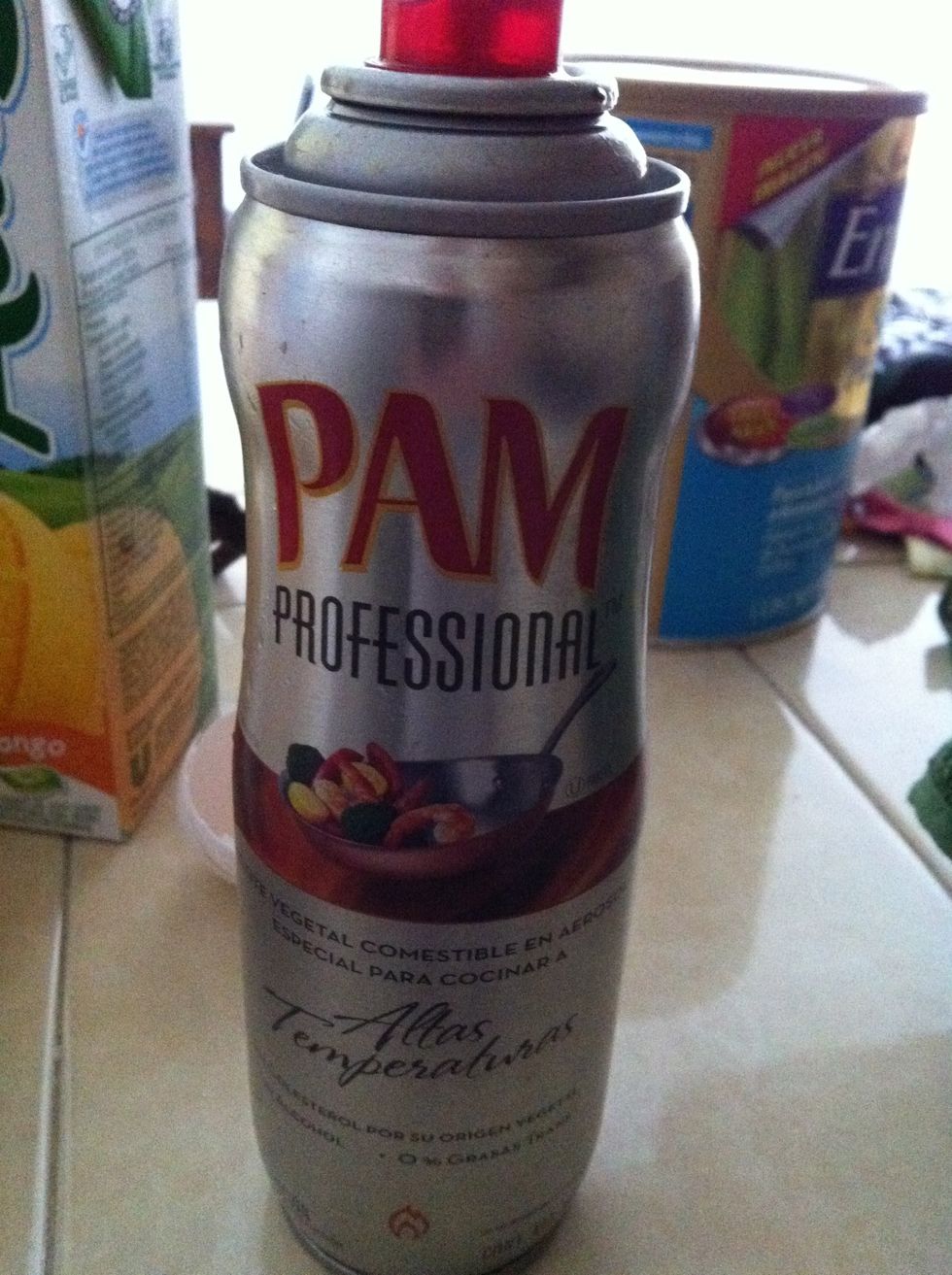 Spray your vegetable oil into Pan or if your baby or you can tolerate a little butter go ahead and use a little bit then soak the bread and place in pan