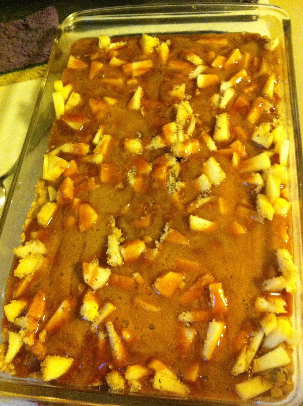 Spread 2 cups of chopped apples and 1/2 cup of chopped walnuts onto baked crust. Then pour hot caramel mixture evenly over apples and nuts.