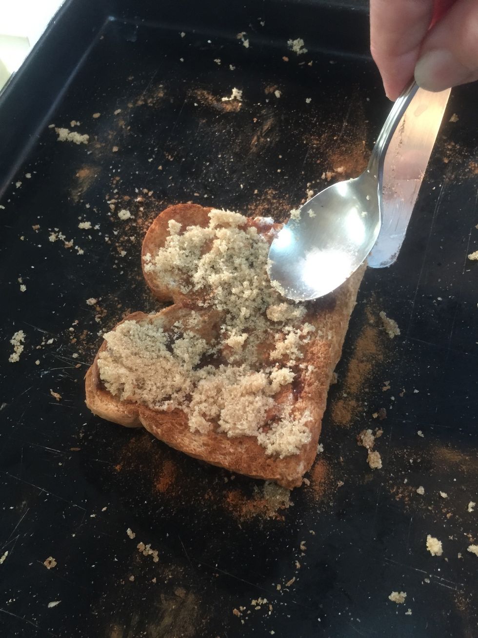 Spread a generous layer of brown sugar evenly with back of spoon...