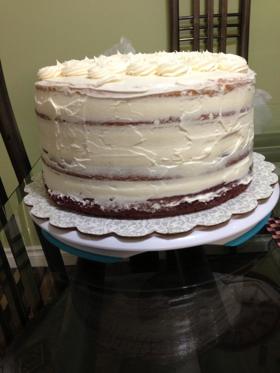 Spread a layer of buttercream as a base for the decorating process and let refrigerate for a few hours.