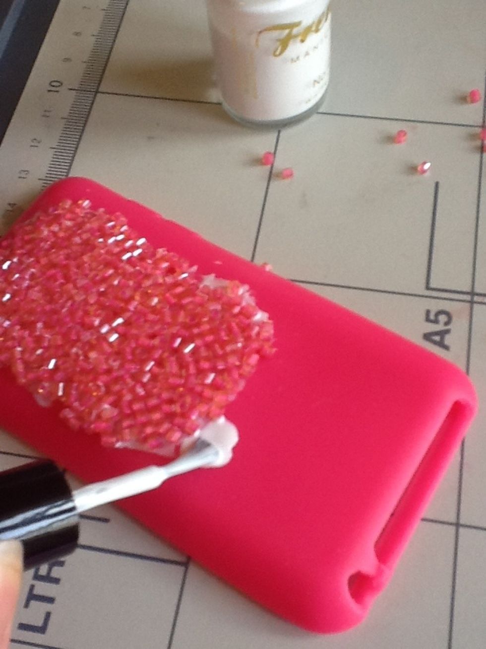 spread a little nail varnish, any colour