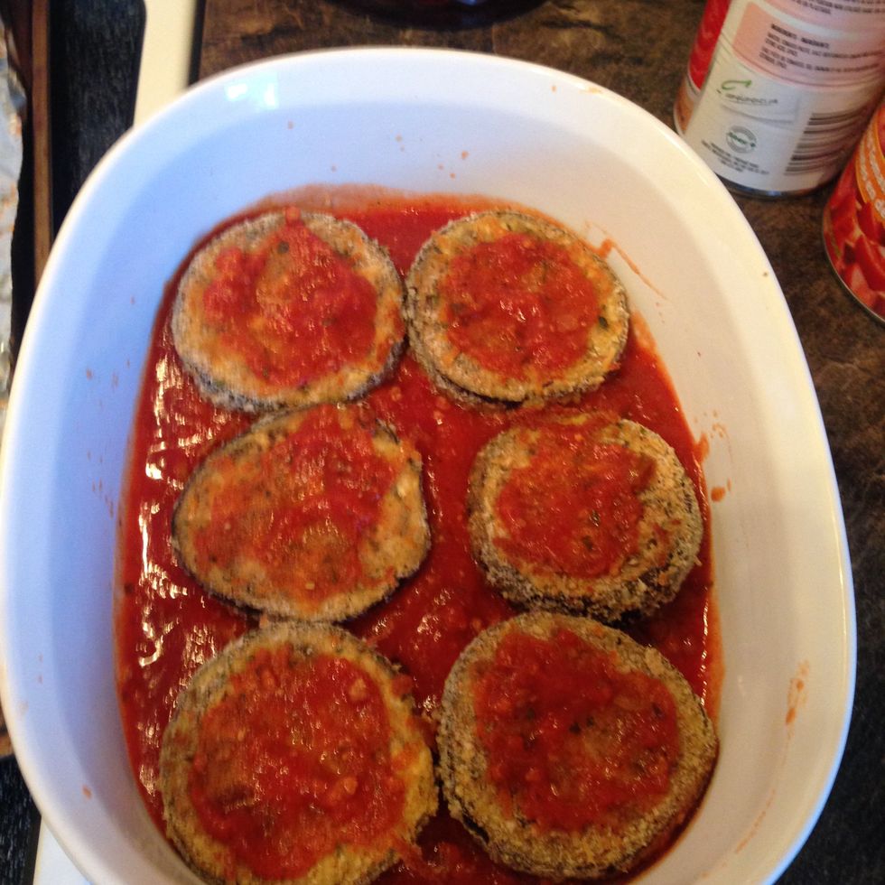 Spread a small spoonful of sauce onto each slice.