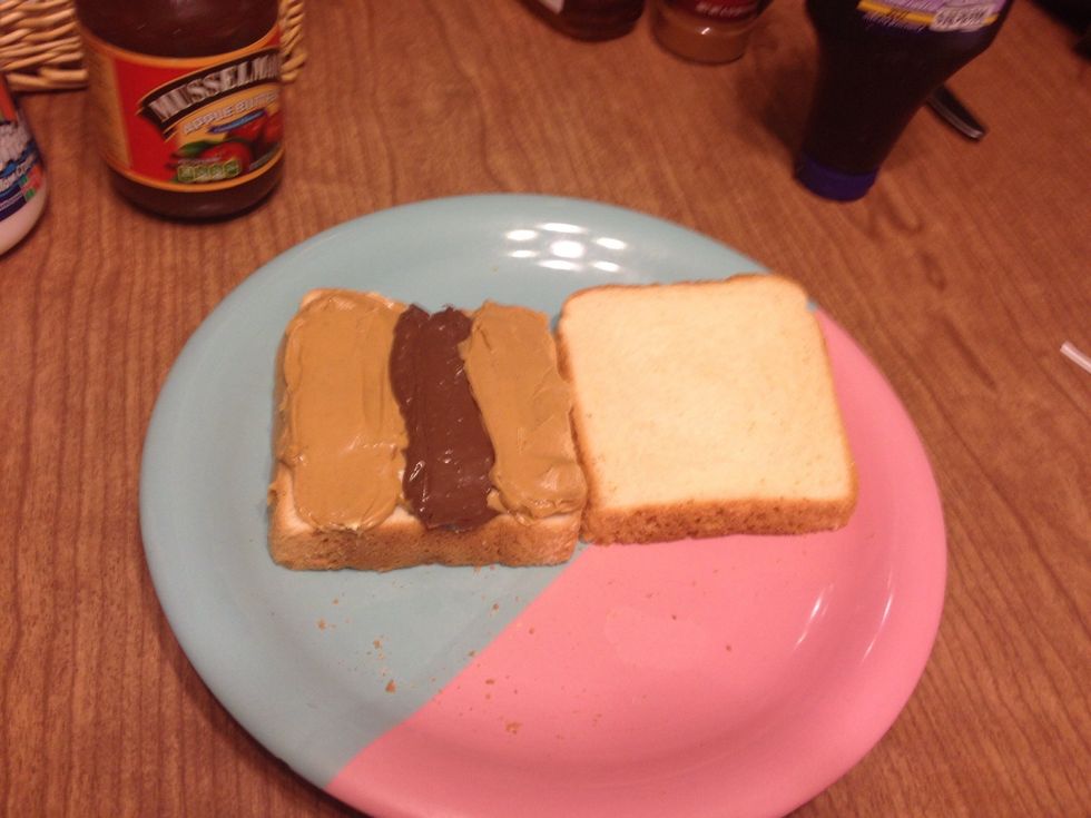 Spread a strip of CHUNKY peanut butter on the remaining third of the bread.