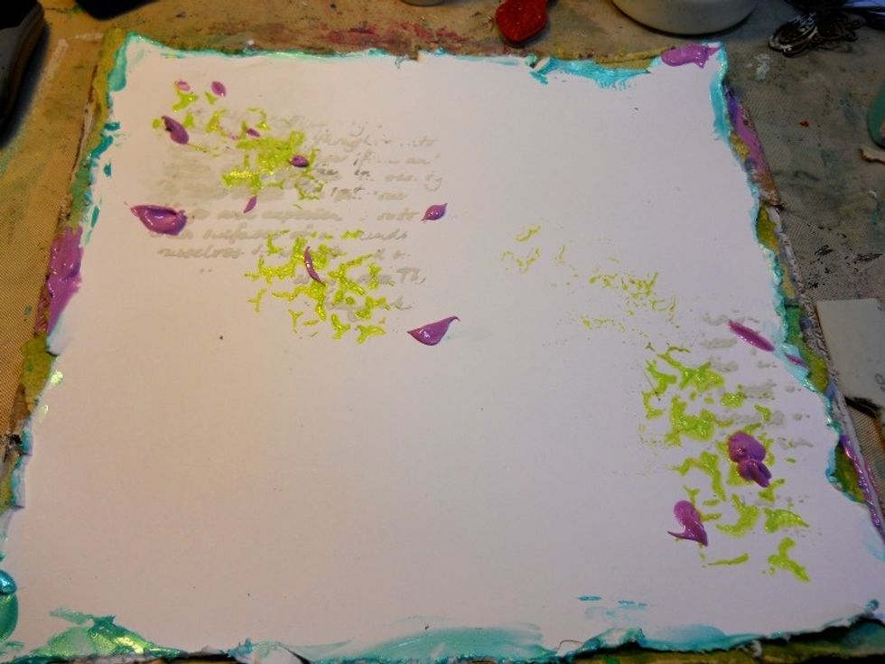 Spread another color through the Art anthology "Cracked" stencil, then add matte medium to a color and splatter onto the white background.